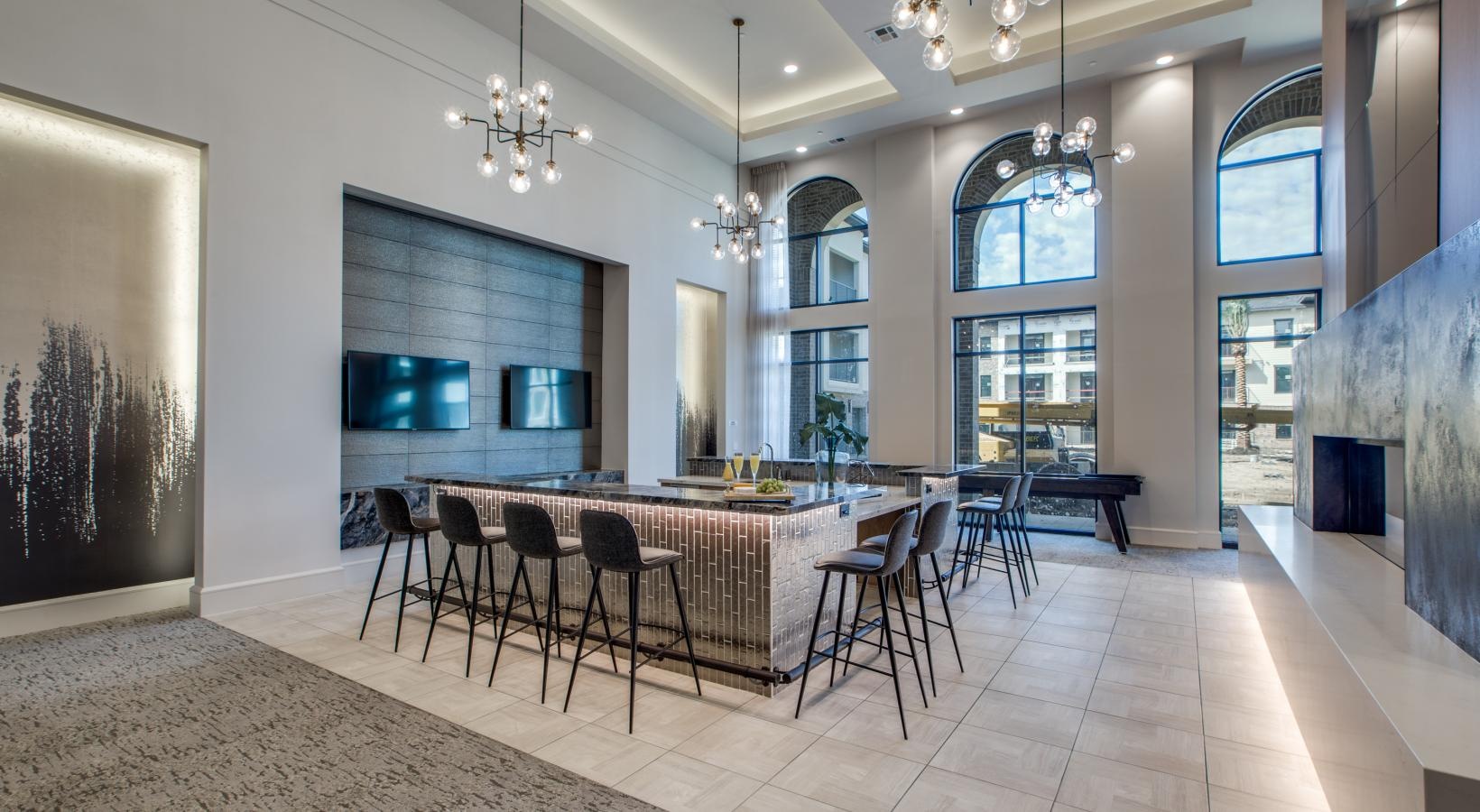 The essence of exceptional living a large room with tables and chairs