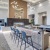 a kitchen with a marble island