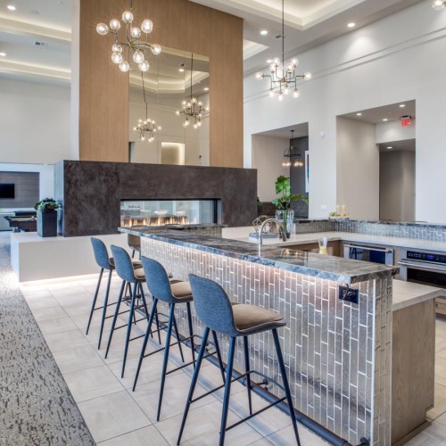 All the comforts of luxury living a kitchen with a marble island