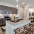 a kitchen with a marble island