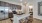 a kitchen with a marble island