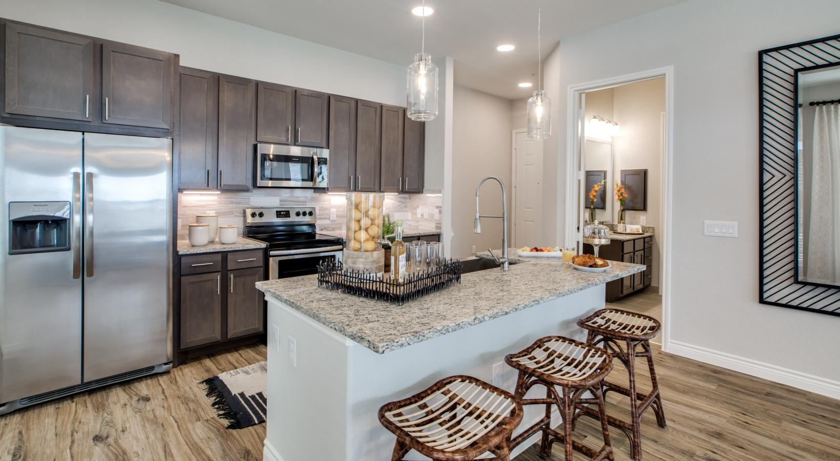 Beautiful kitchens with designer finishes a kitchen with a marble island