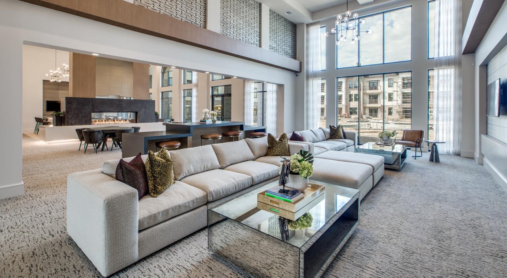 Settle into comfort at Berkshire Exchange a large living room with a large window