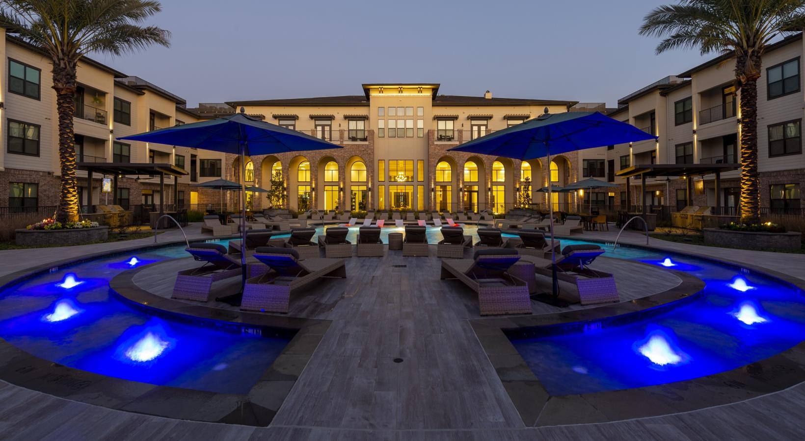 The essence of exceptional living a pool in front of a building