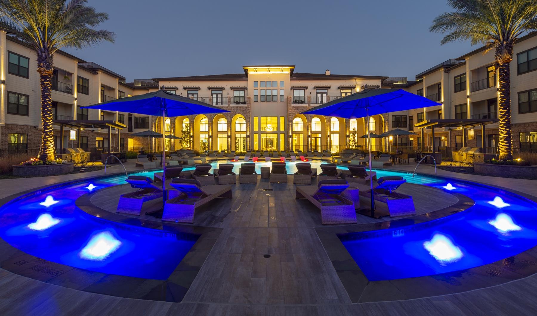 The essence of exceptional living a pool in front of a building